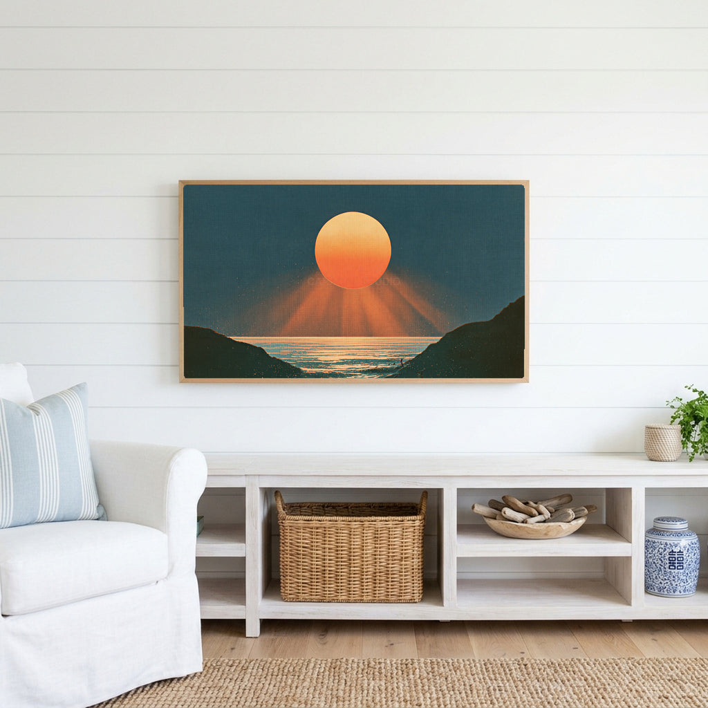 Ocean sunset Frame TV art above a white console with a rattan basket in a coastal living room