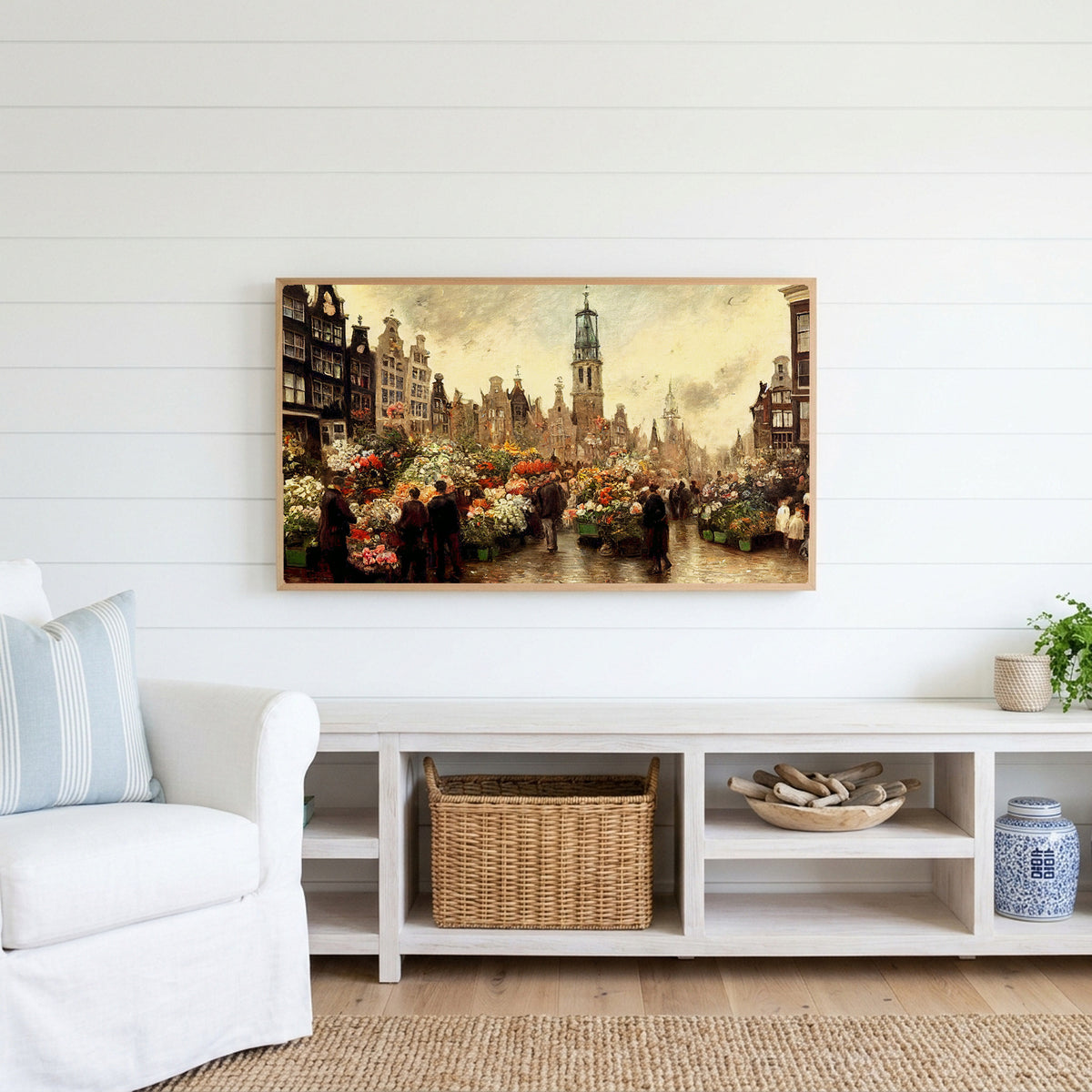 Amsterdam flower market Frame TV art above a white console with a rattan basket in a coastal living room