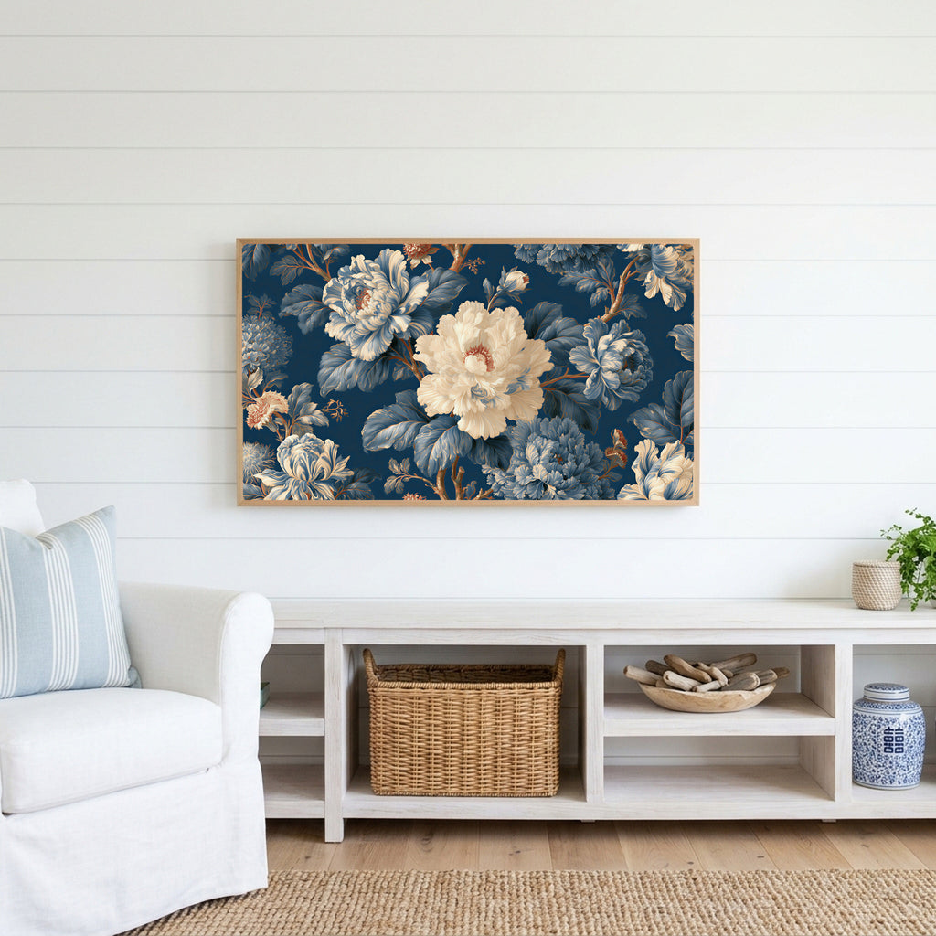 Blue and cream peonies Frame TV art above a white console with a rattan basket in a coastal living room
