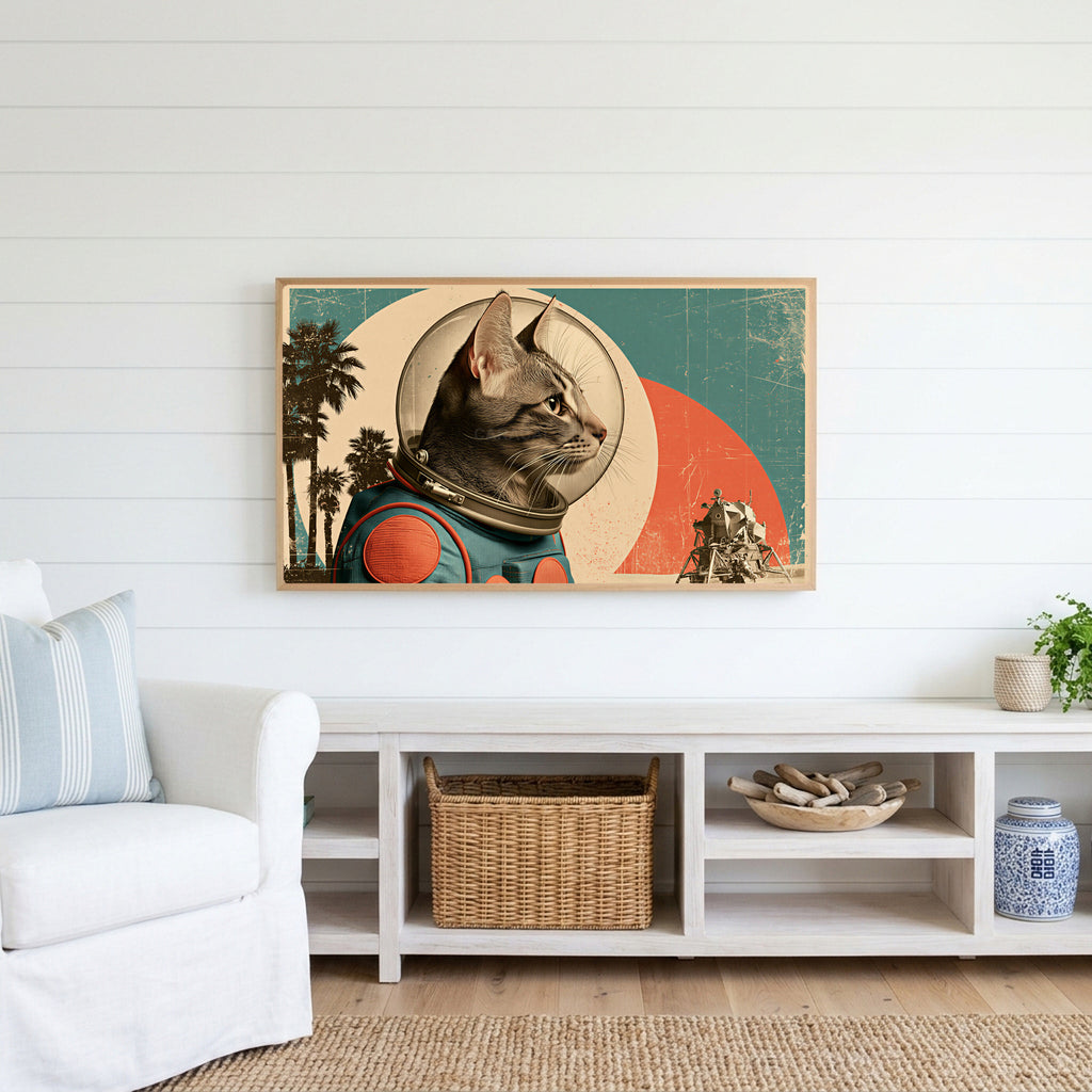 Vintage astronaut cat Frame TV art above a white console with a rattan basket in a coastal living room