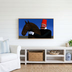 Man in red fez with horse Frame TV art above a white console with a rattan basket in a coastal living room