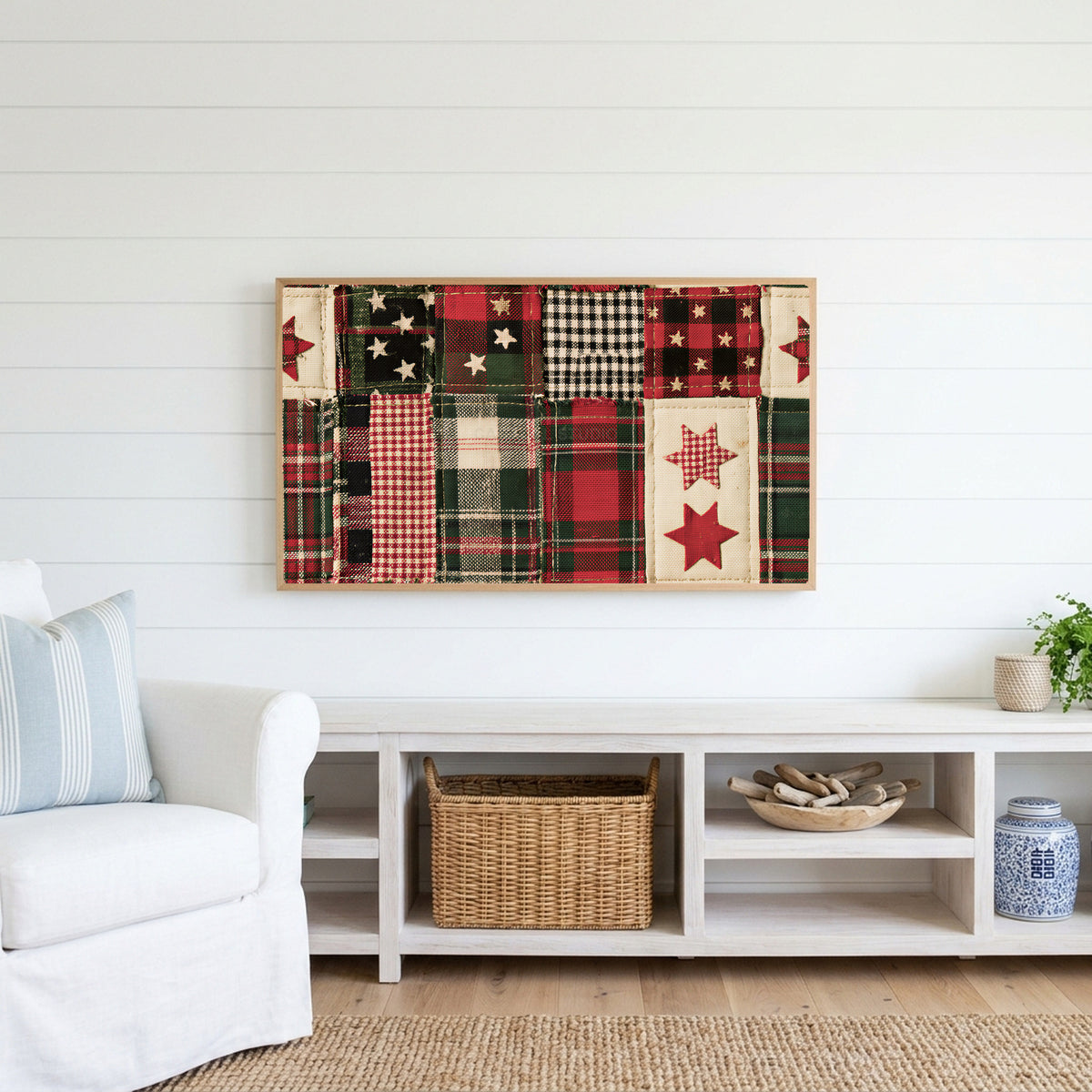 Plaid patchwork quilt Frame TV art above a white console with a rattan basket in a coastal living room