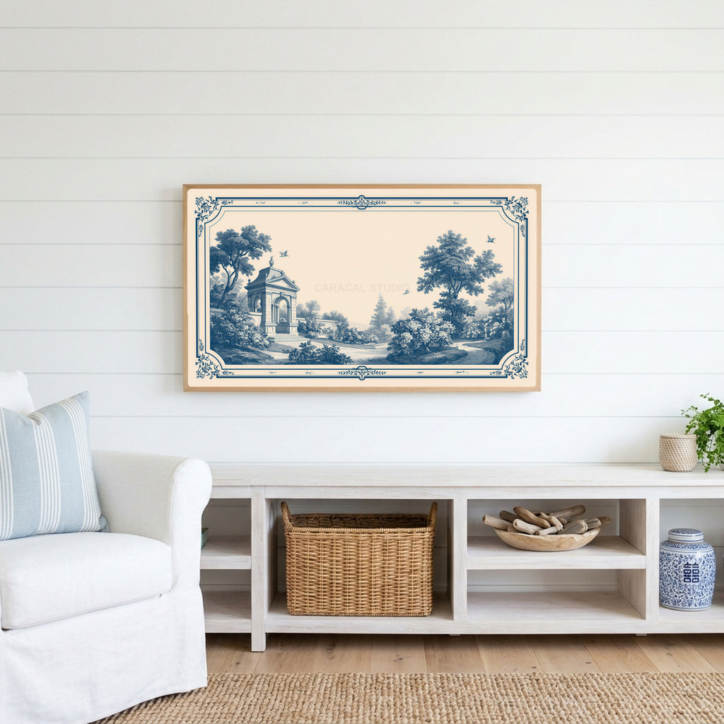 Blue toile garden Frame TV art above a white console with a rattan basket in a coastal living room