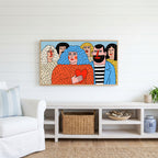 Colorful naive crowd with a heart Frame TV art above a white console with a rattan basket in a coastal living room
