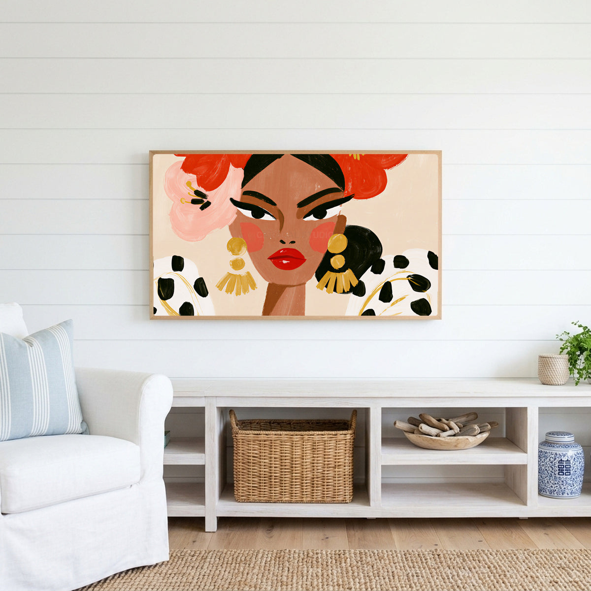 Fashion portrait Frame TV art above a white console with a rattan basket in a coastal living room