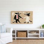 Badger bride and groom Frame TV art above a white console with a rattan basket in a coastal living room