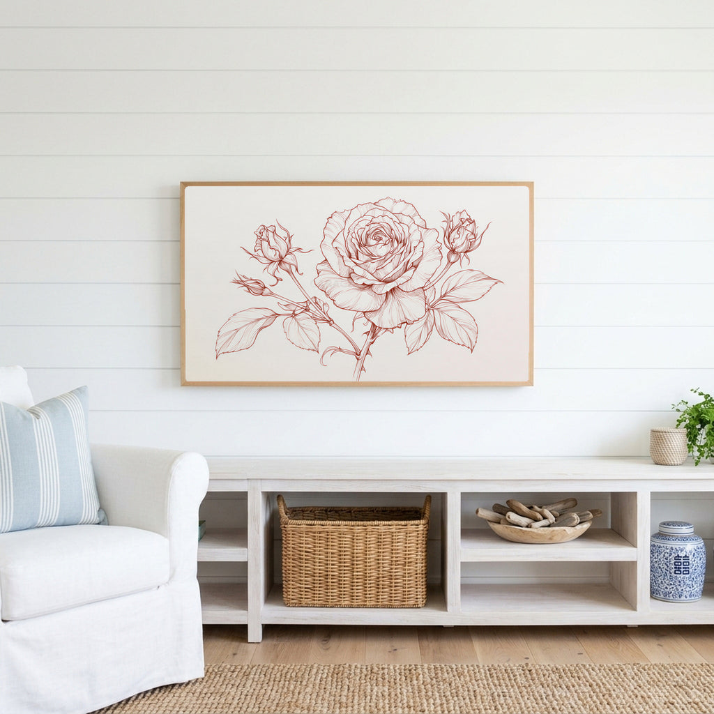 Rose line drawing Frame TV art above a white console with a rattan basket in a coastal living room