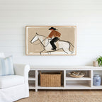 Cowboy on a horse Frame TV art above a white console with a rattan basket in a coastal living room