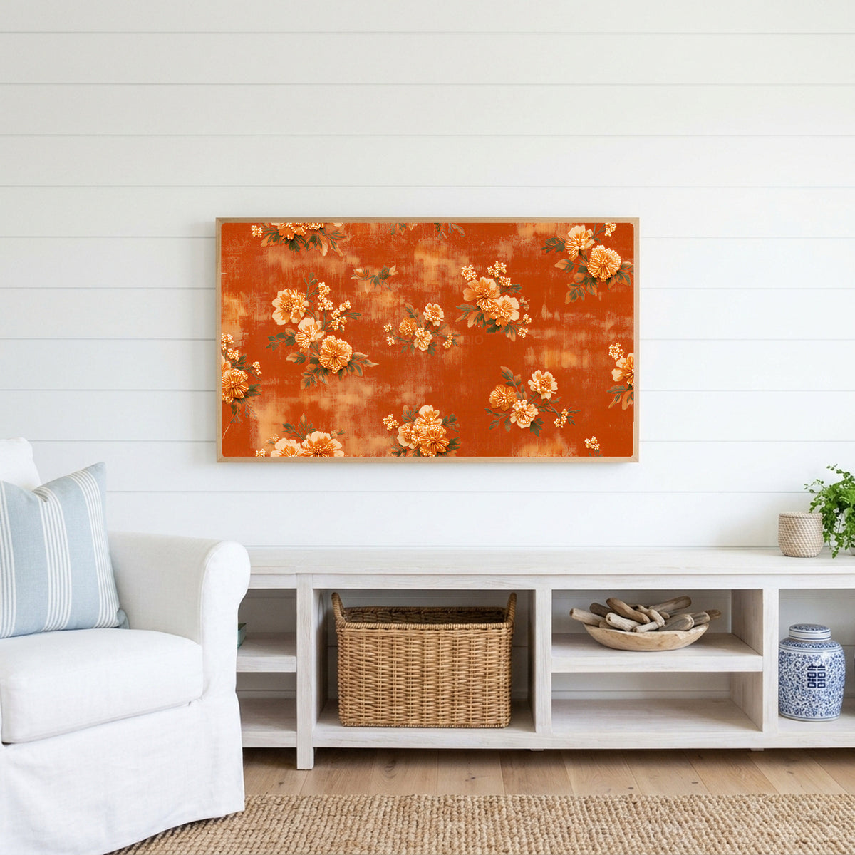 Beaded flowers Frame TV art above a white console with a rattan basket in a coastal living room