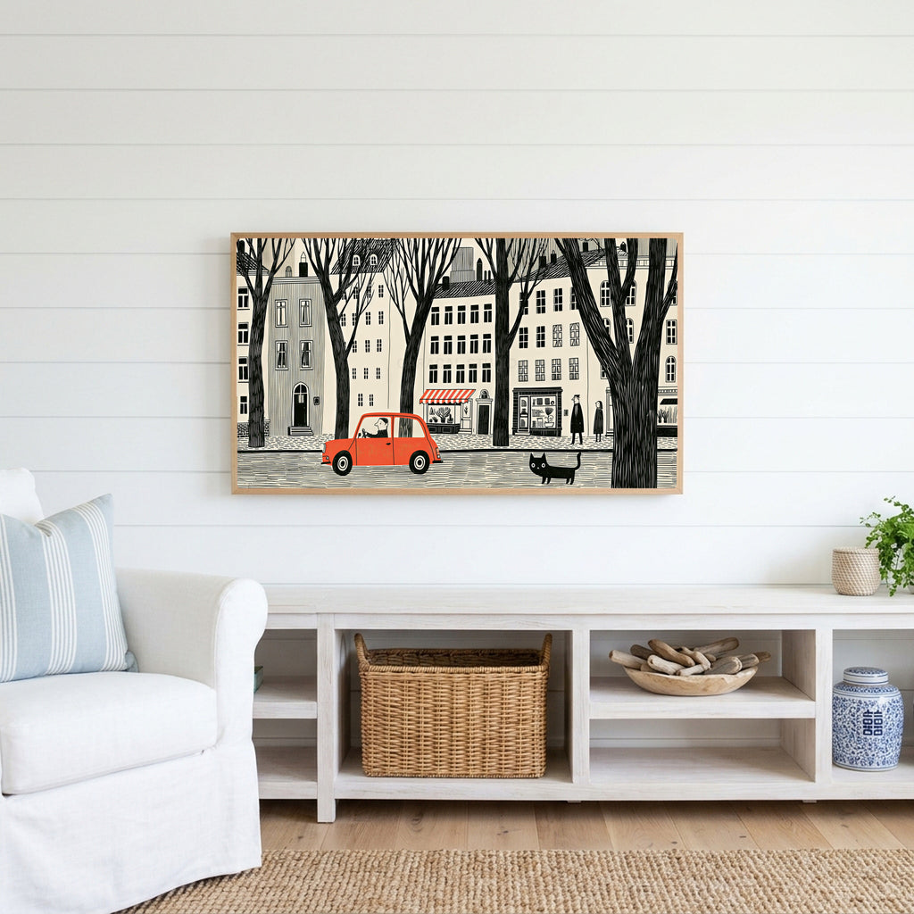 City street Frame TV art above a white console with a rattan basket in a coastal living room