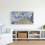Lighthouse on a cliff Frame TV art above a white console with a rattan basket in a coastal living room