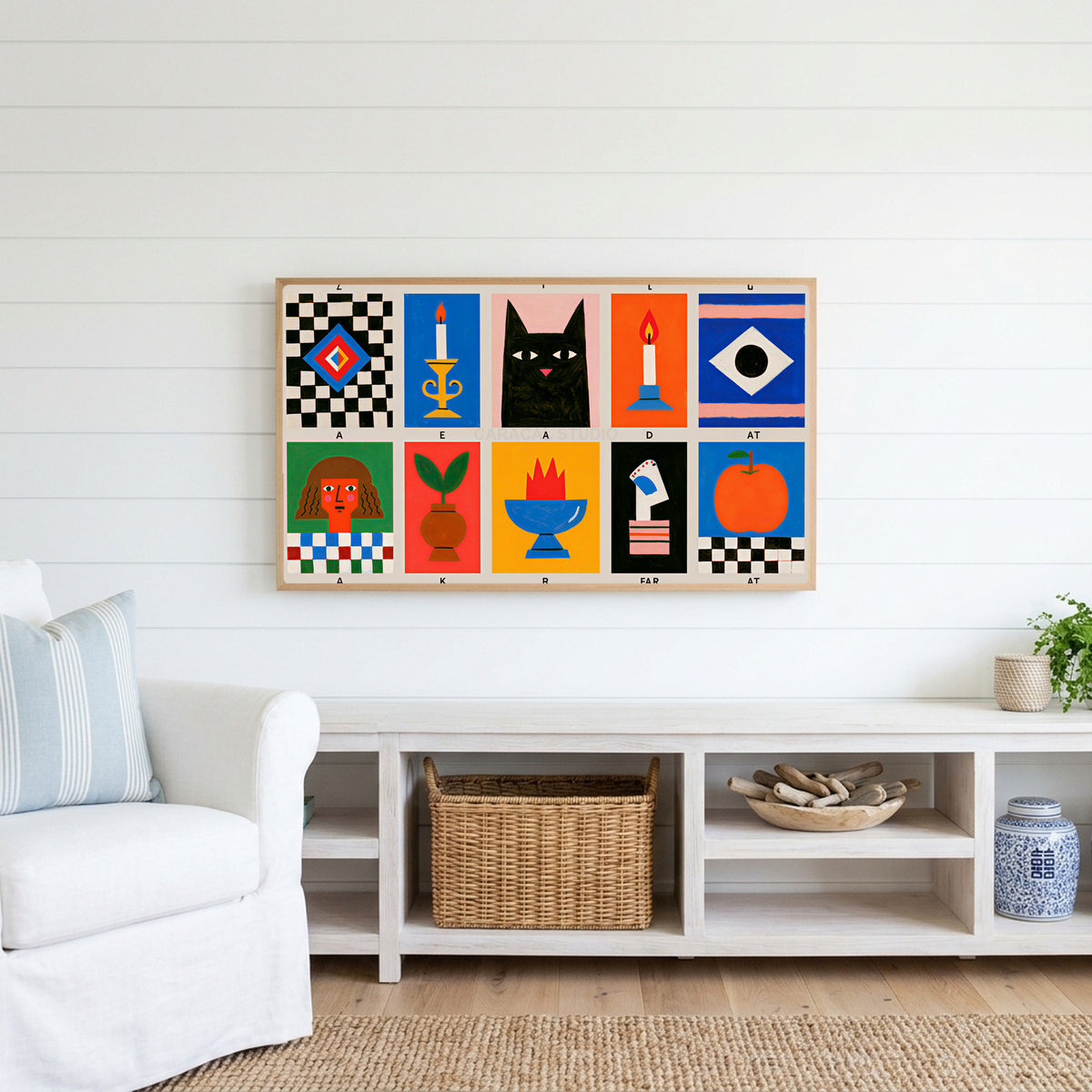 Mid century grid Frame TV art above a white console with a rattan basket in a coastal living room