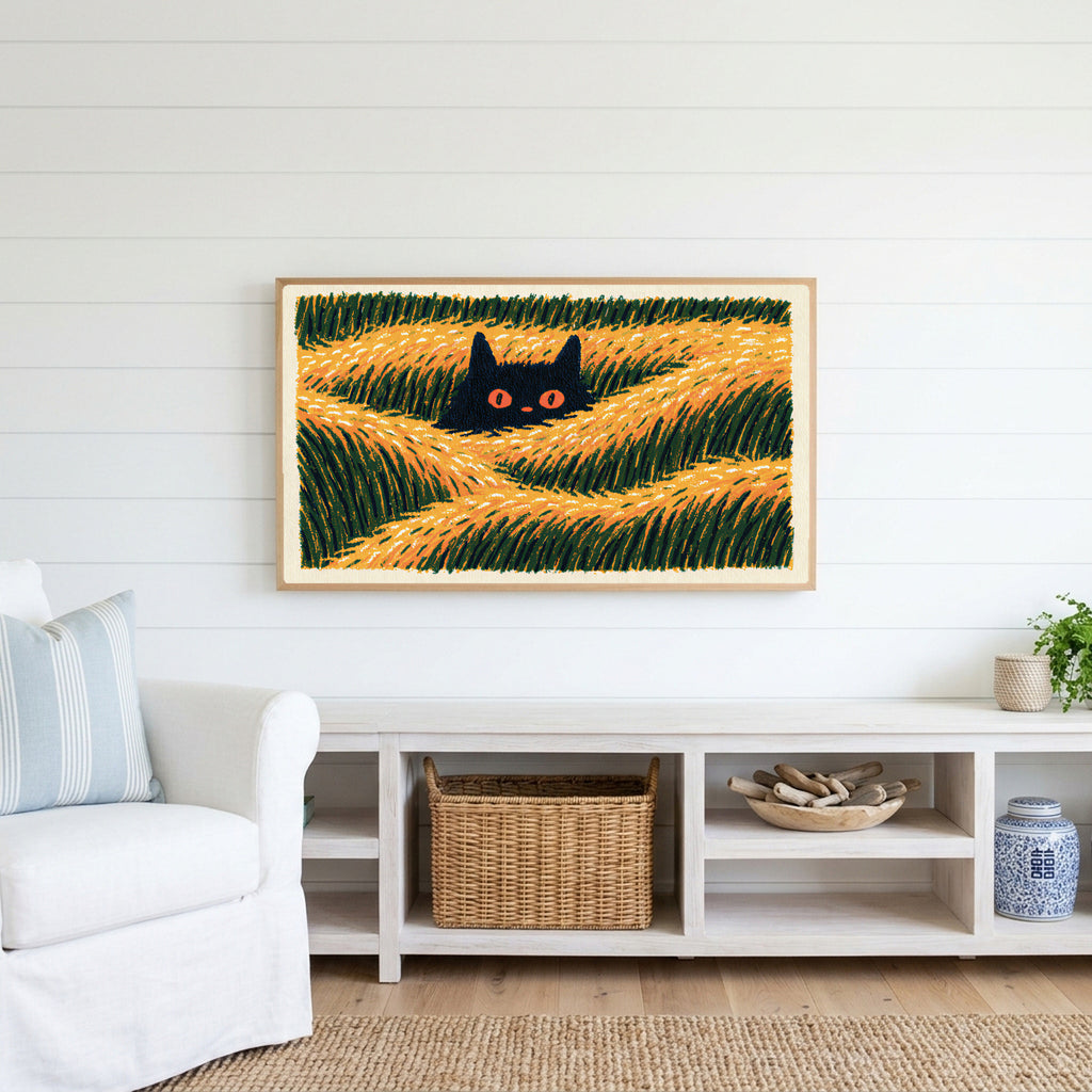 Black cat in grass Frame TV art above a white console with a rattan basket in a coastal living room