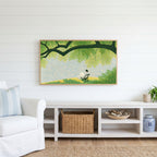 Lake and tree landscape Frame TV art above a white console with a rattan basket in a coastal living room