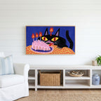 Birthday cat Frame TV art above a white console with a rattan basket in a coastal living room