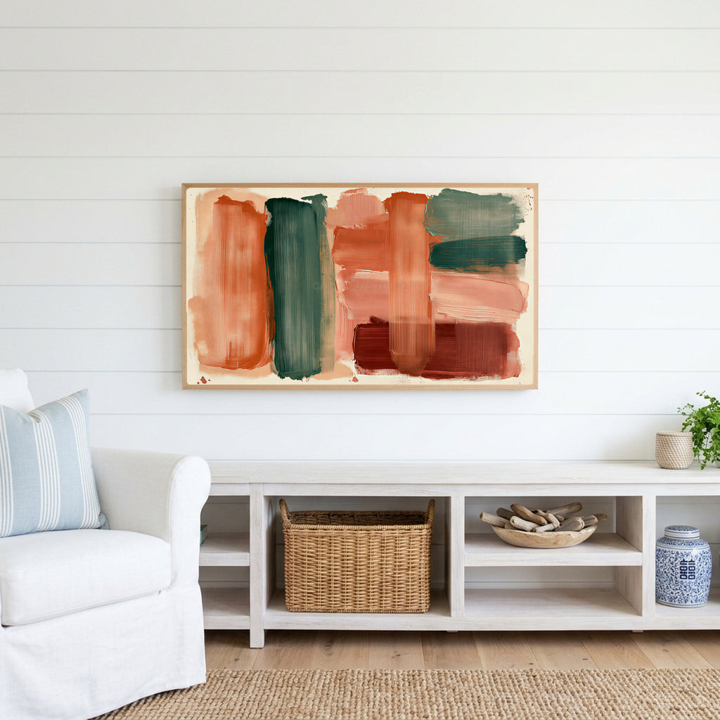 Boho brushstroke Frame TV art above a white console with a rattan basket in a coastal living room