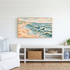 Beach waves Frame TV art above a white console with a rattan basket in a coastal living room