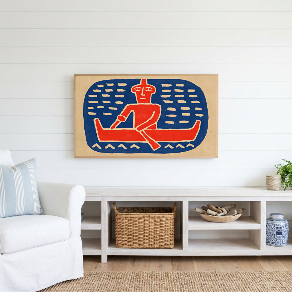 Folk art canoe paddler Frame TV art above a white console with a rattan basket in a coastal living room