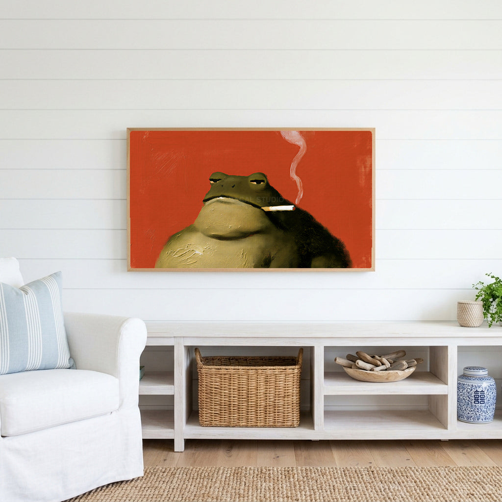 Smoking toad Frame TV art above a white console with a rattan basket in a coastal living room