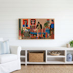 Eclectic retro room Frame TV art above a white console with a rattan basket in a coastal living room