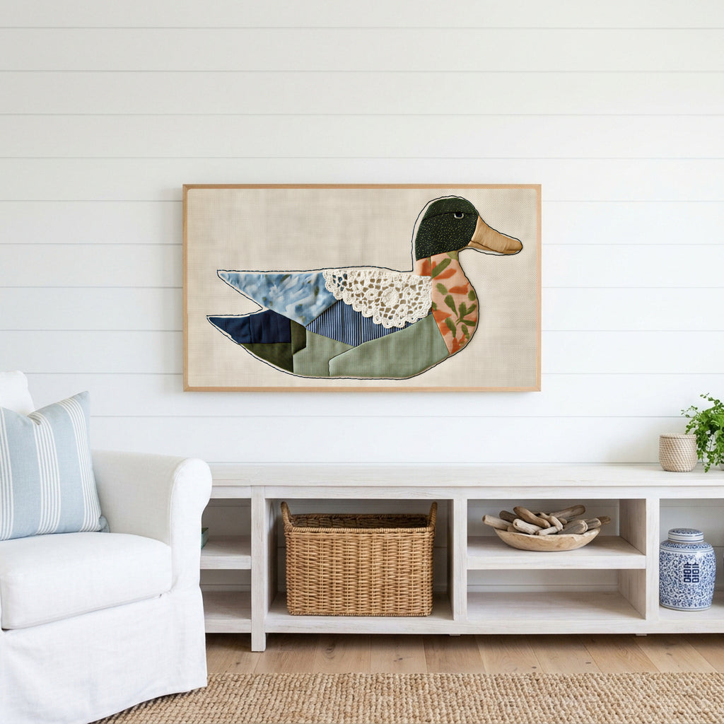 Patchwork duck Frame TV art above a white console with a rattan basket in a coastal living room