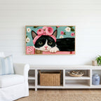 Cat with a flower crown Frame TV art above a white console with a rattan basket in a coastal living room