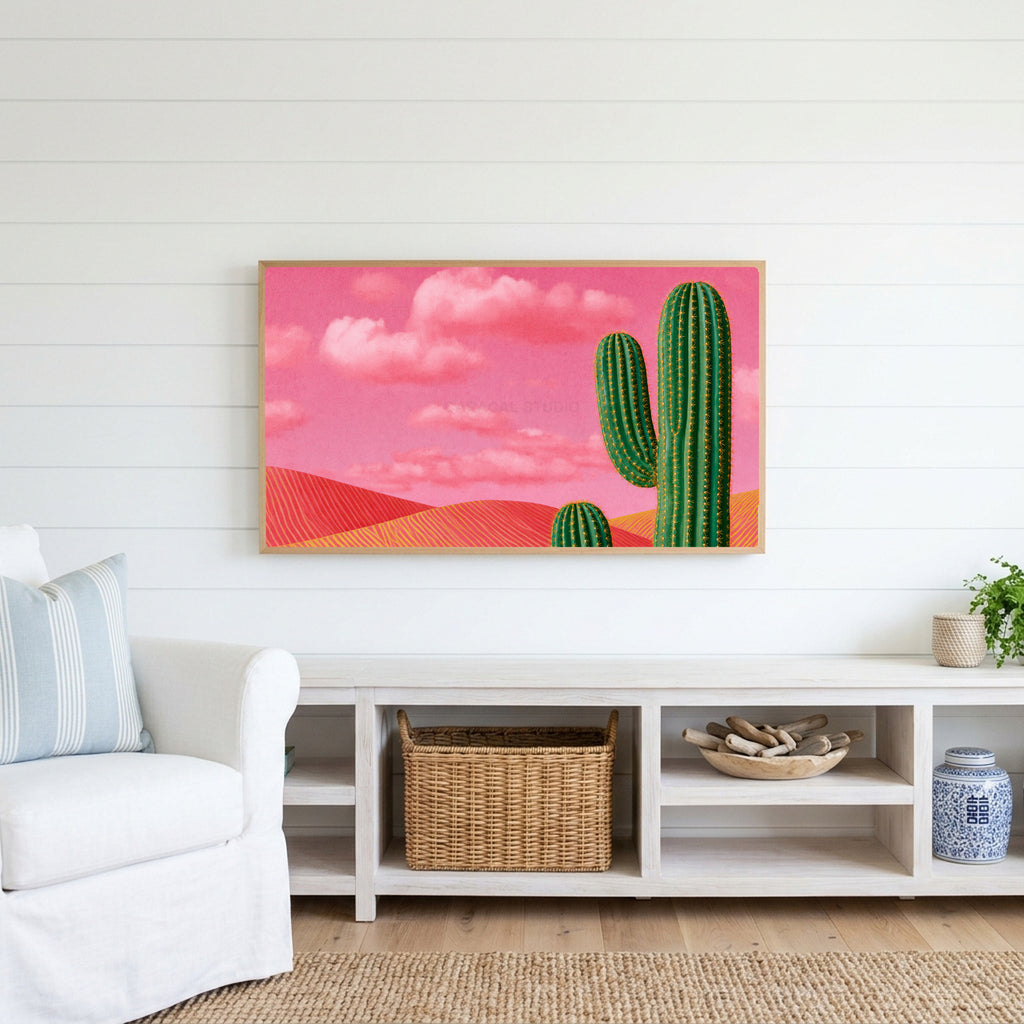 Saguaro cactus Frame TV art above a white console with a rattan basket in a coastal living room