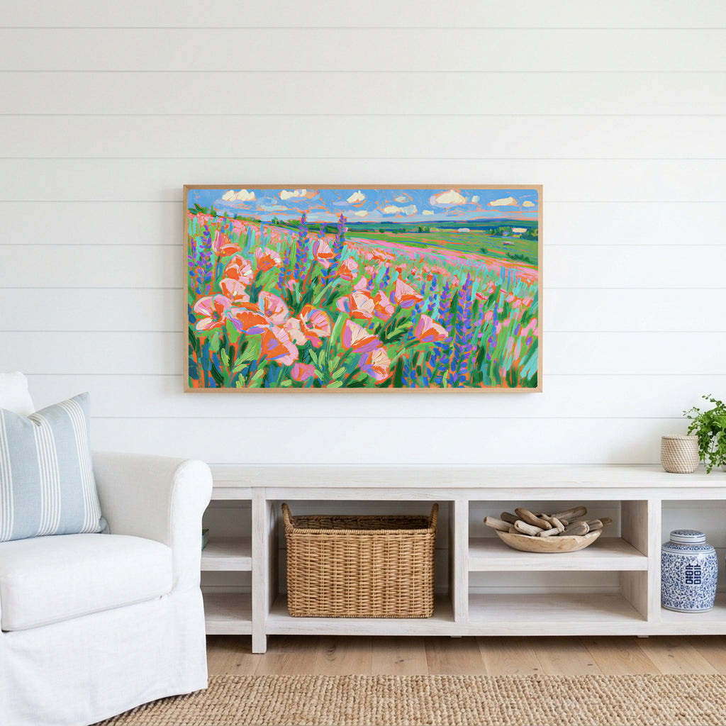 Poppy field Frame TV art above a white console with a rattan basket in a coastal living room