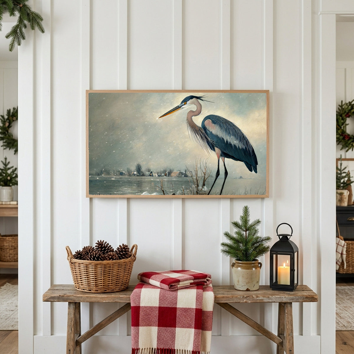 Winter Frame TV art above a rustic bench with pine cones and a red check blanket on a white plank wall