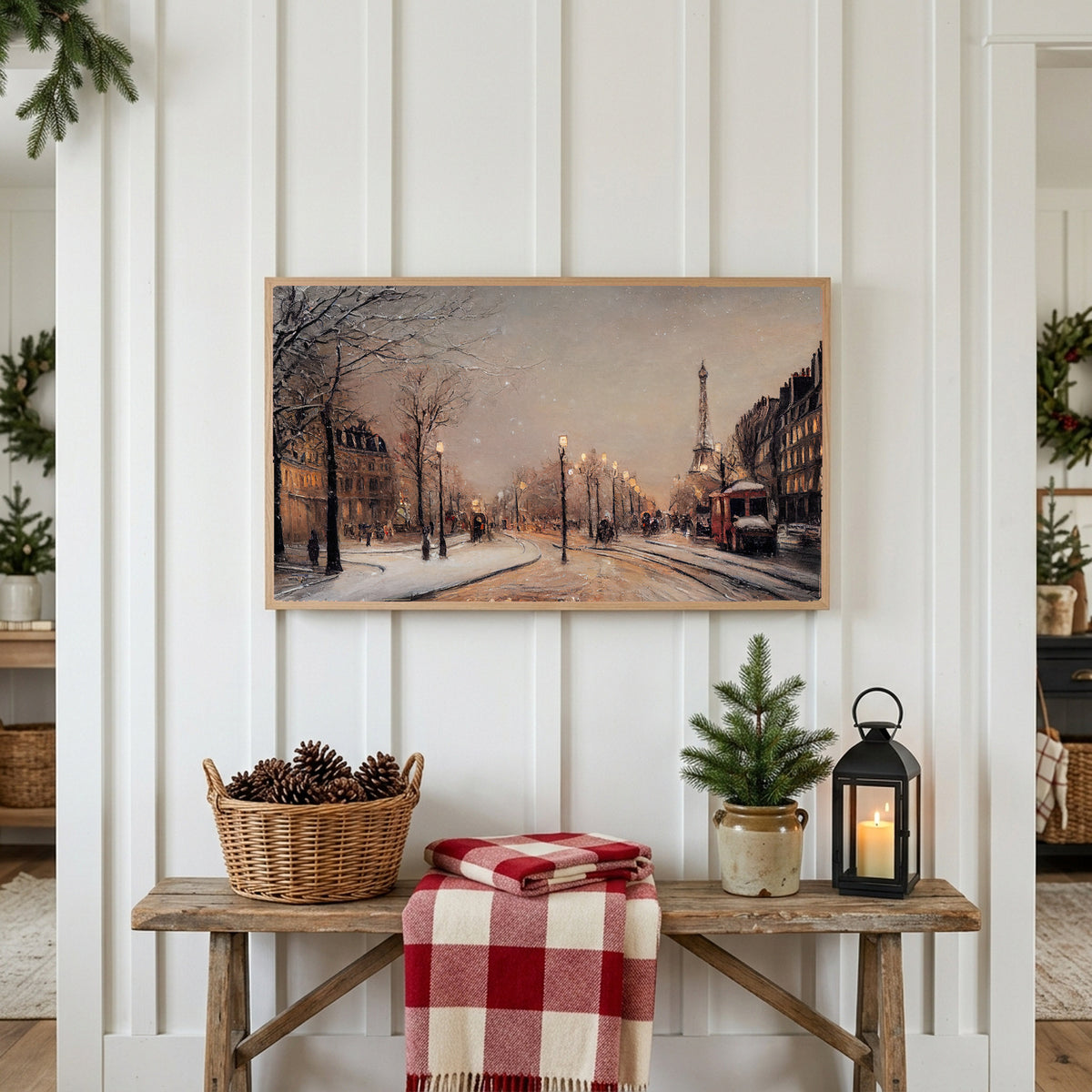 Christmas Frame TV art above a rustic bench with pine cones and a red check blanket on a white plank wall