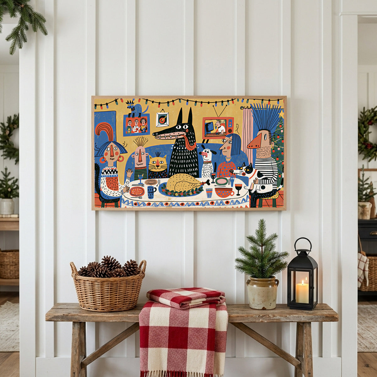 Folk art Christmas dinner Frame TV art above a rustic bench with pine cones and a red check blanket on a white plank wall