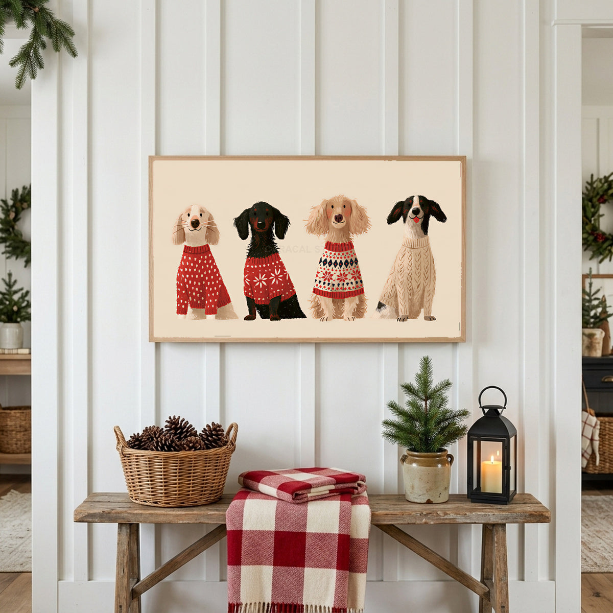 Dogs in holiday sweaters Frame TV art above a rustic bench with pine cones and a red check blanket on a white plank wall