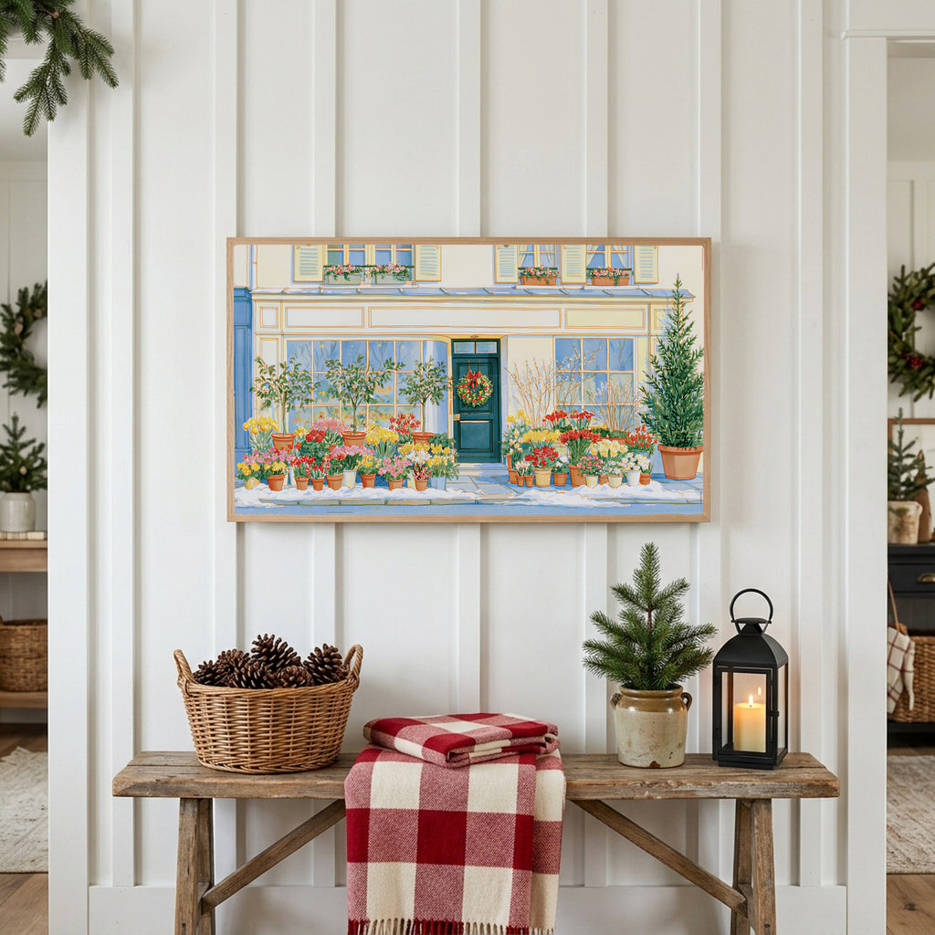 Paris flower shop Christmas Frame TV art above a rustic bench with pine cones and a red check blanket on a white plank wall