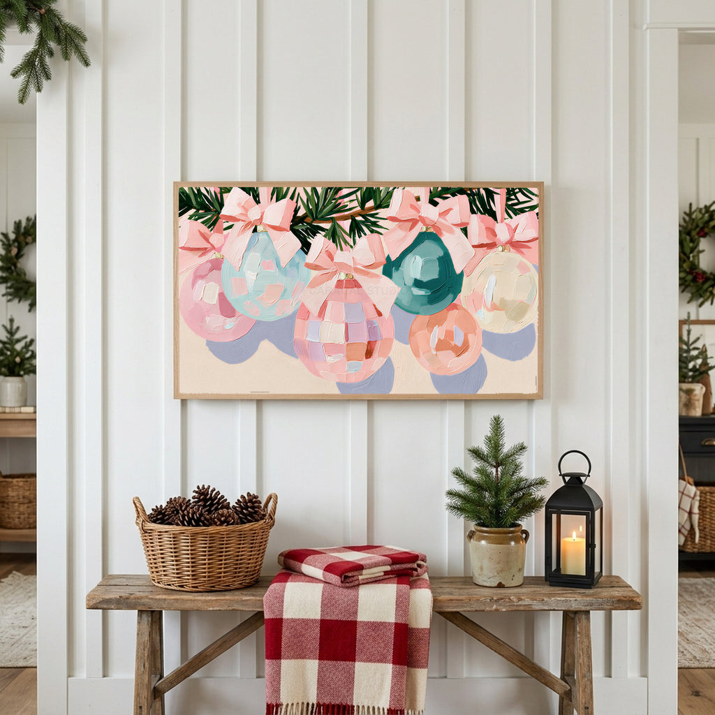 Pastel Christmas ornaments Frame TV art above a rustic bench with pine cones and a red check blanket on a white plank wall