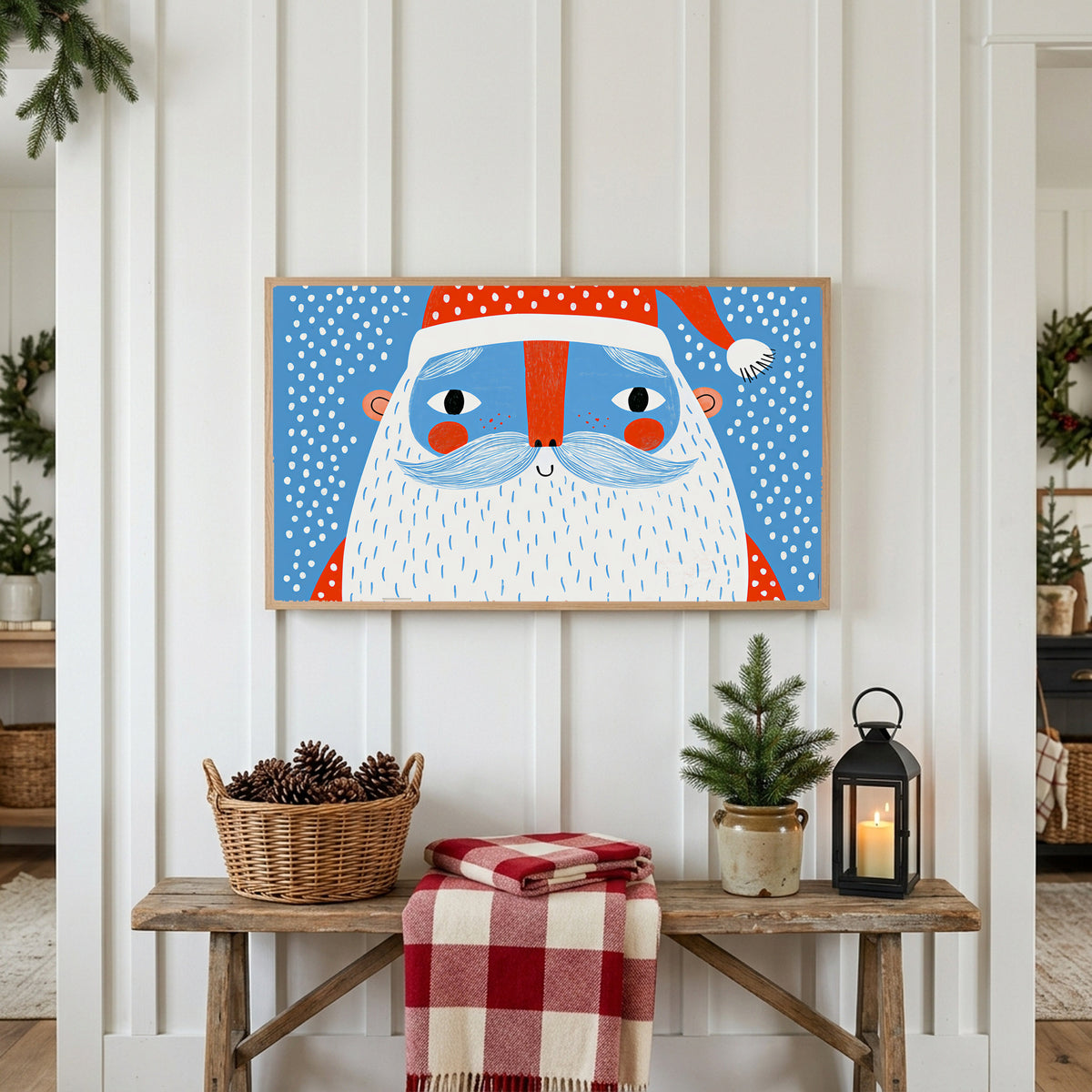 Santa face Frame TV art above a rustic bench with pine cones and a red check blanket on a white plank wall