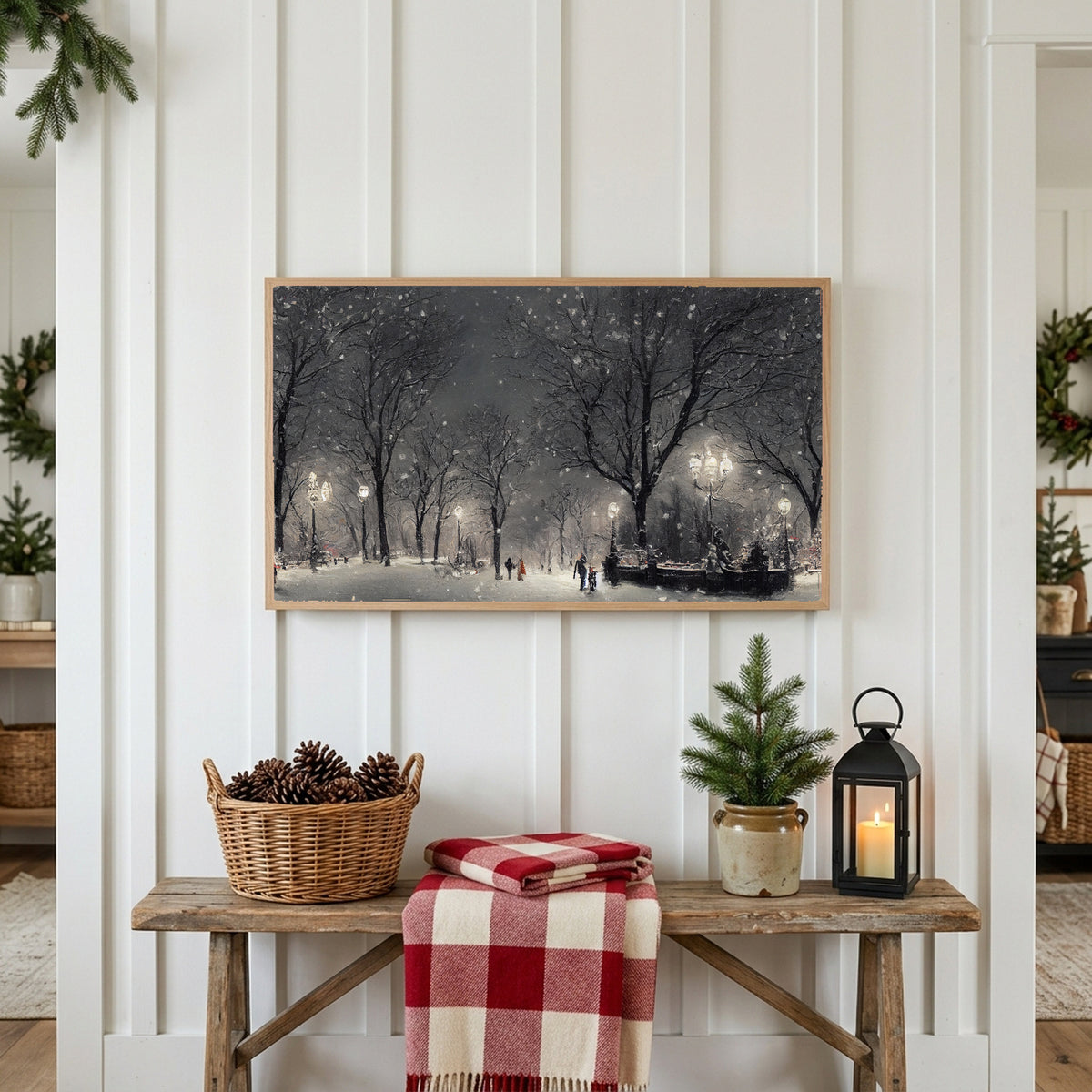 Winter Frame TV art above a rustic bench with pine cones and a red check blanket on a white plank wall