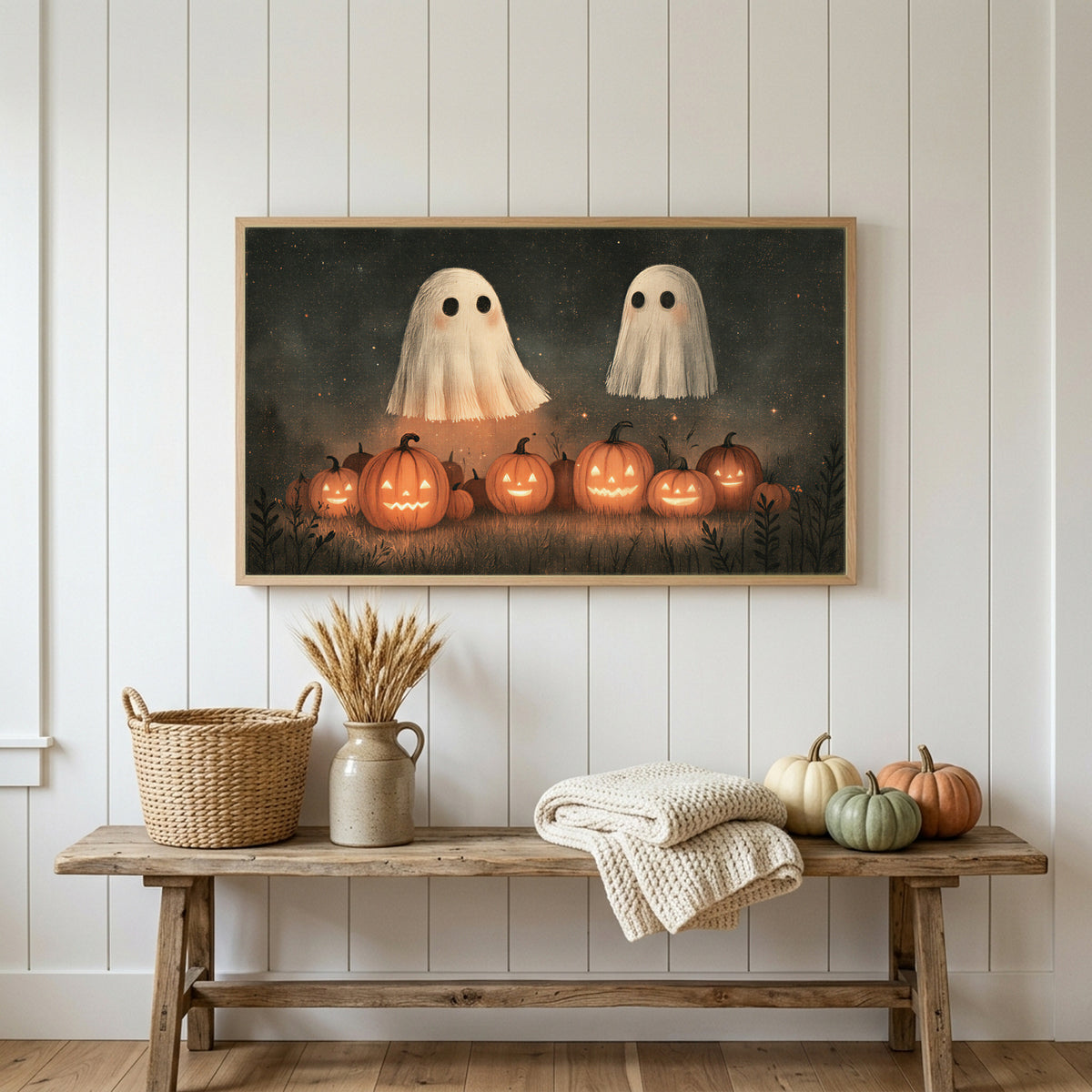 Halloween Frame TV art above a rustic bench with heirloom pumpkins on a white plank wall