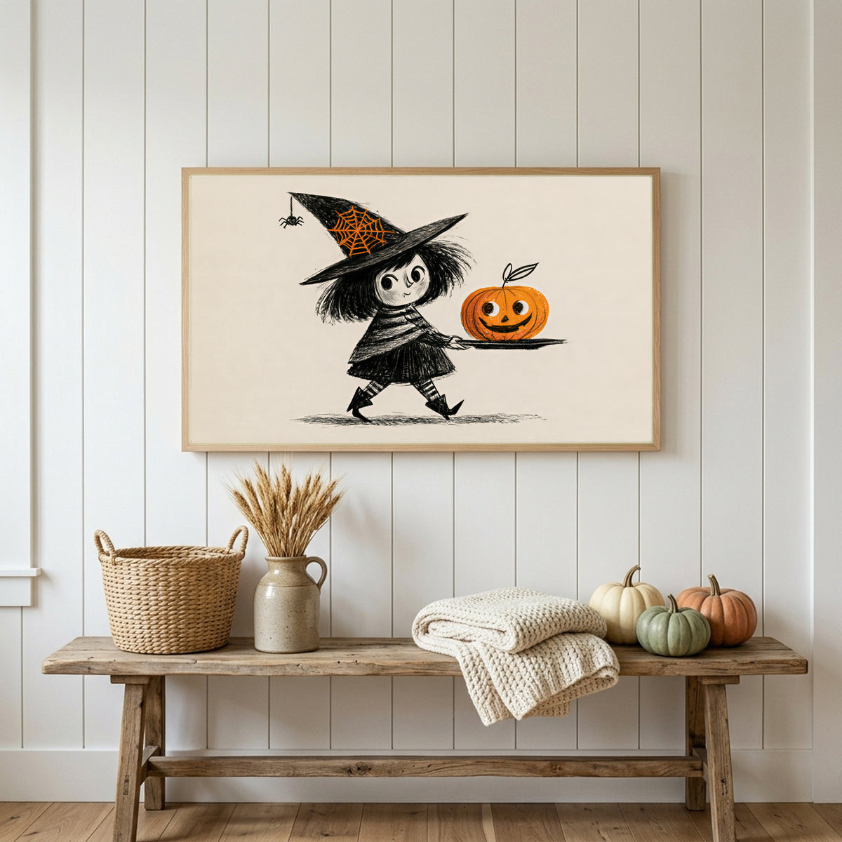 Halloween Frame TV art above a rustic bench with heirloom pumpkins on a white plank wall