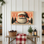 Santa portrait Frame TV art above a rustic bench with pine cones and a red check blanket on a white plank wall