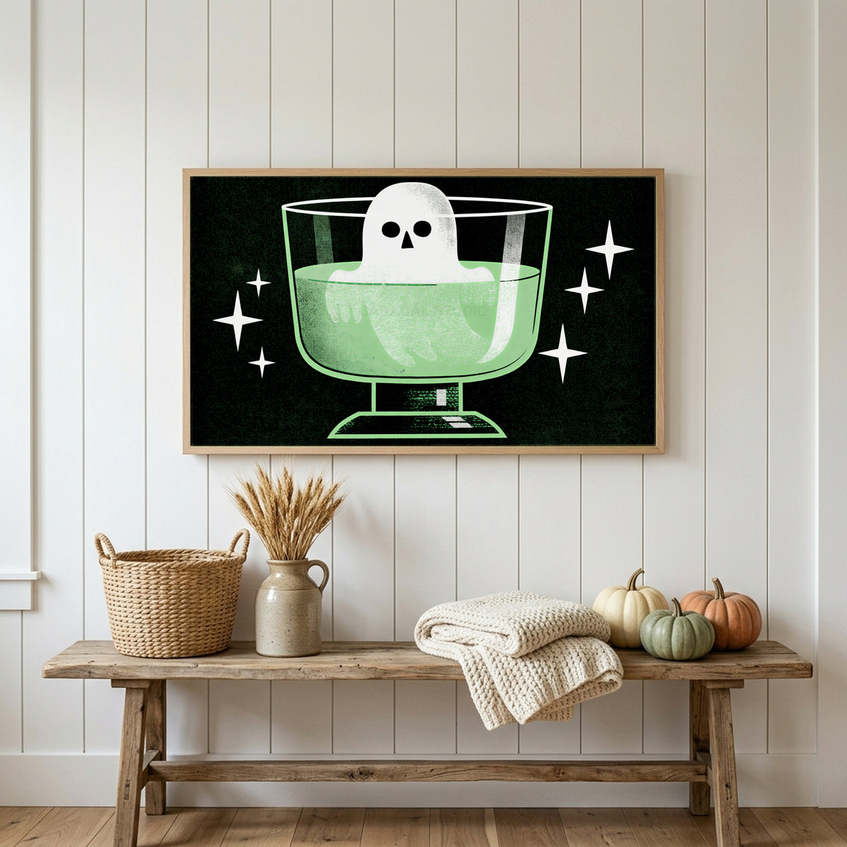 Halloween Frame TV art above a rustic bench with heirloom pumpkins on a white plank wall