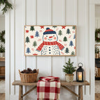 Snowman Frame TV art above a rustic bench with pine cones and a red check blanket on a white plank wall