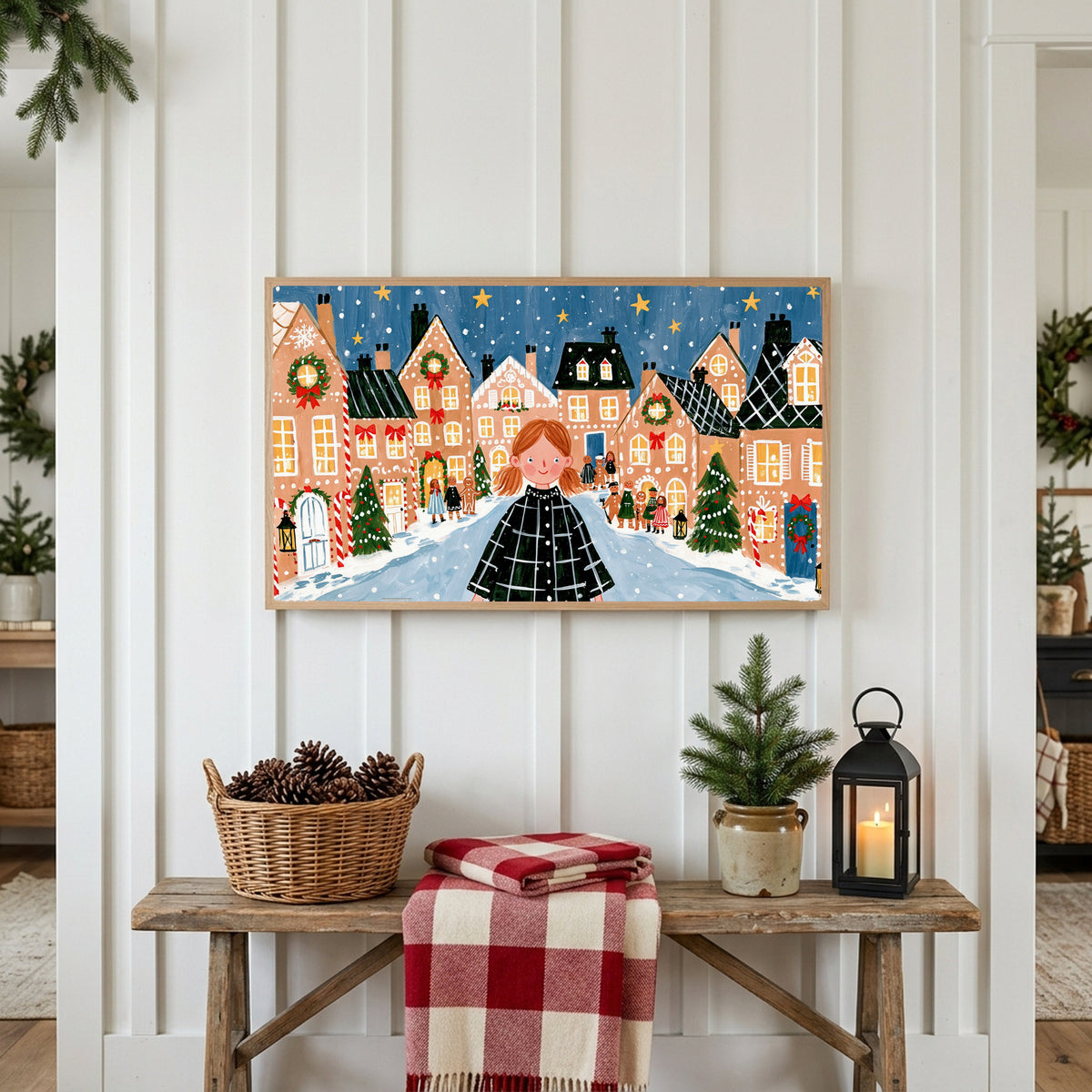 Christmas Frame TV art above a rustic bench with pine cones and a red check blanket on a white plank wall