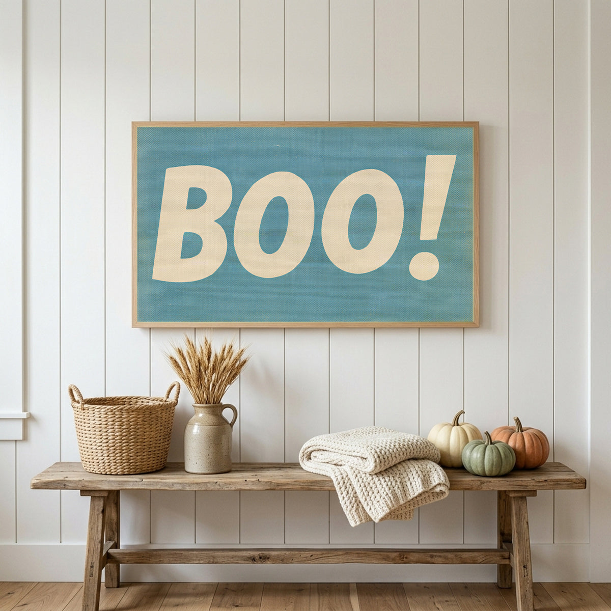 Halloween Frame TV art above a rustic bench with heirloom pumpkins on a white plank wall