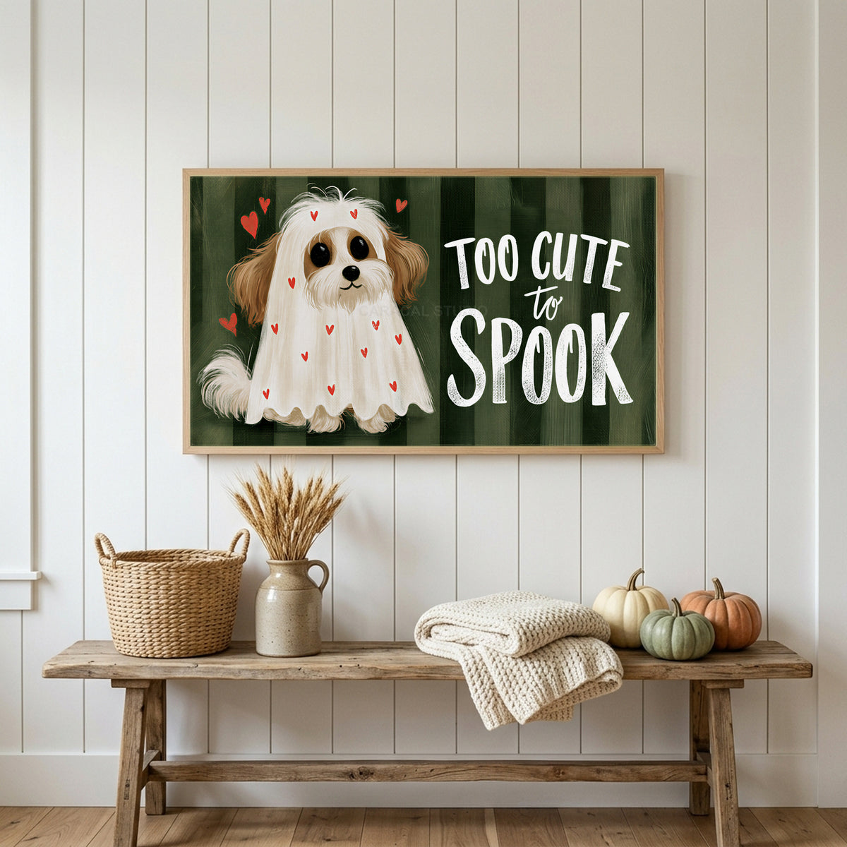 Dog ghost Frame TV art above a rustic bench with heirloom pumpkins on a white plank wall
