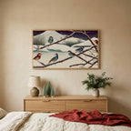 Songbirds on snowy branches TV art above an oak dresser with small bottle-brush trees in a calm bedroom
