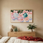 Pastel Christmas ornaments TV art above an oak dresser with small bottle-brush trees in a calm bedroom