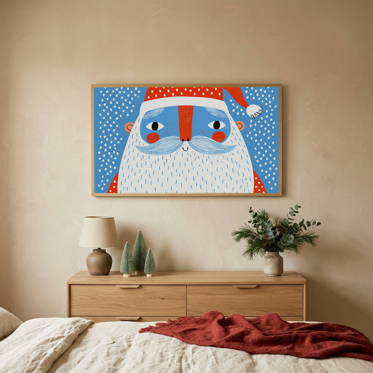 Santa face TV art above an oak dresser with small bottle-brush trees in a calm bedroom