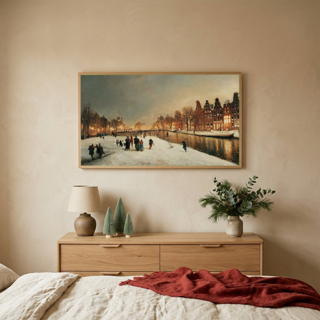 Amsterdam canal in snow TV art above an oak dresser with small bottle-brush trees in a calm bedroom