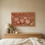 Folk art pumpkins TV art above an oak dresser in a calm bedroom