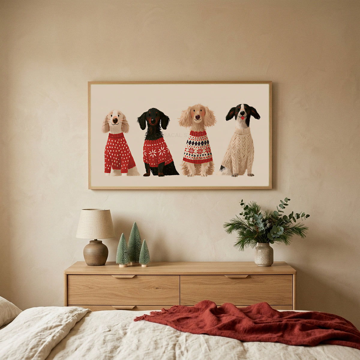 Dogs in holiday sweaters TV art above an oak dresser with small bottle-brush trees in a calm bedroom